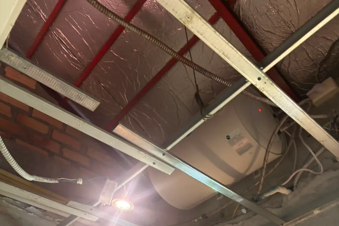 Replacement water heater fitted in the ceiling void of a Phuket villa